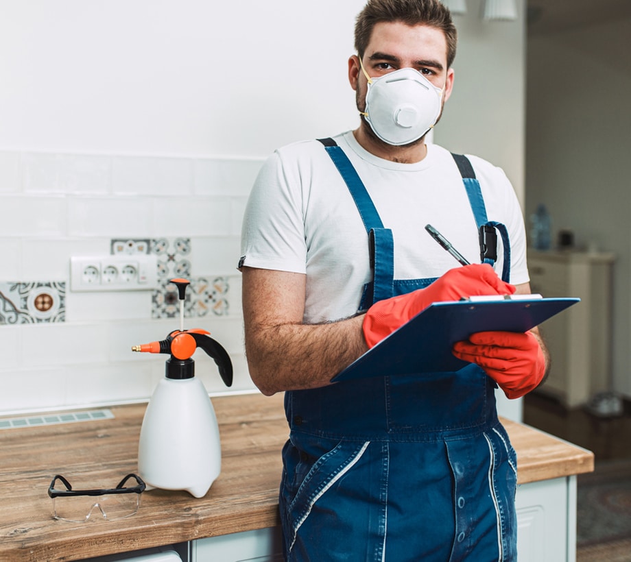 a man standing in a kitchen