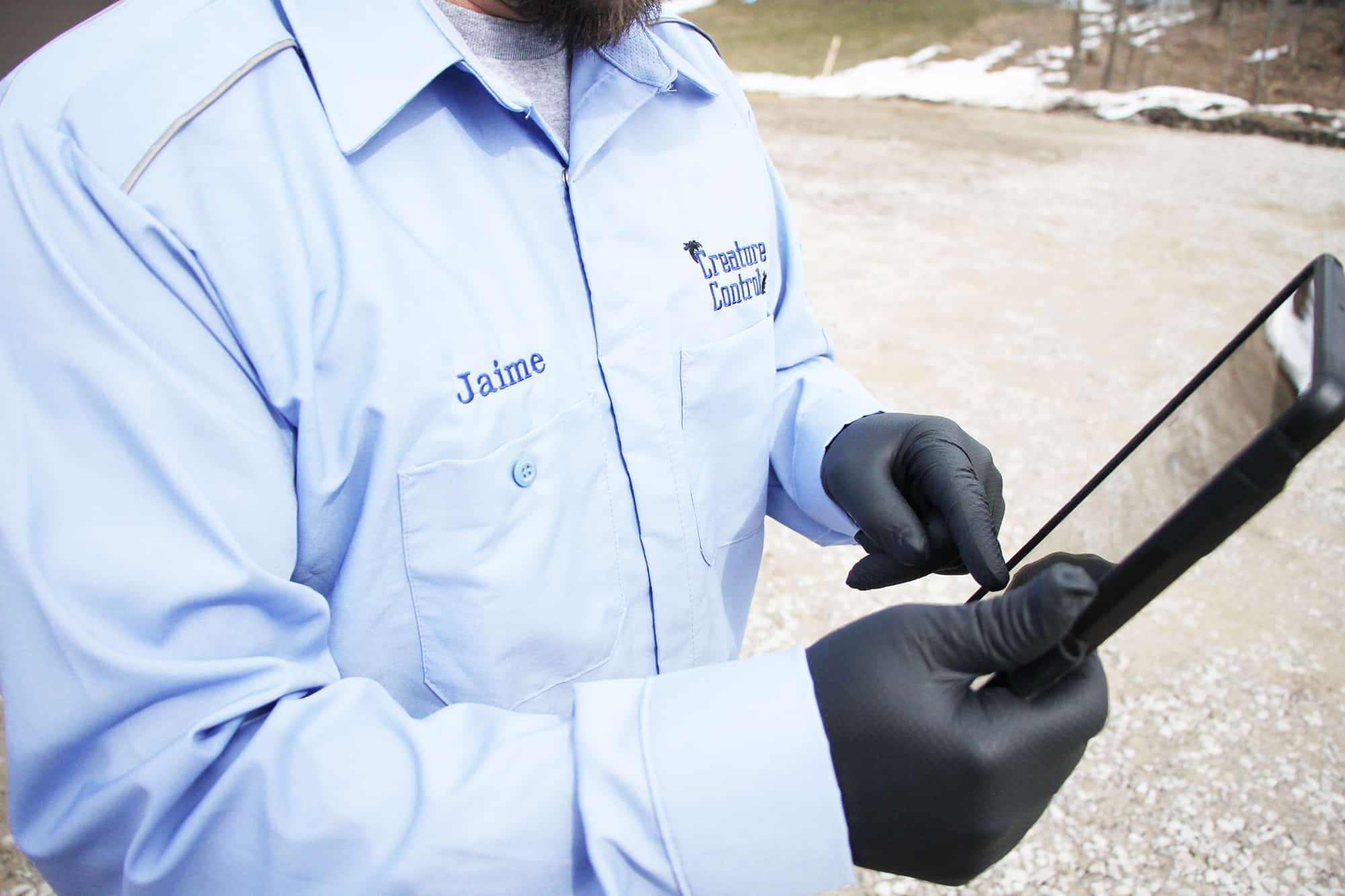 a person posing for the camera with a tablet